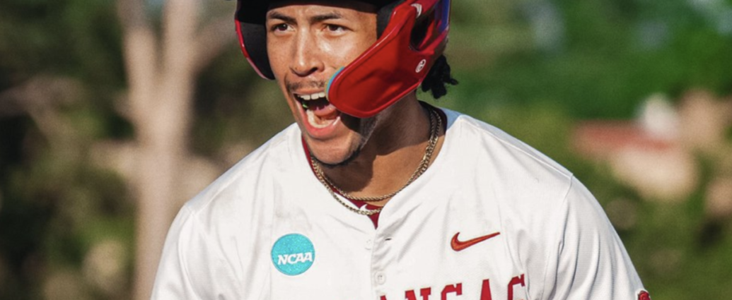 Arkansas outfielder Damian Ruiz celebrates a hit against Missouri State at regionals.