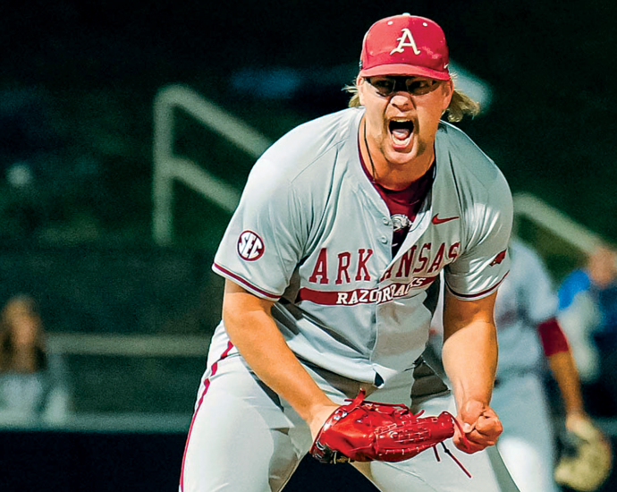 Arkansas Reliever Lands Hogs in National Spotlight Arkansas pitcher Ethan McElvain screams after throwing a strikeout against Kentucky.