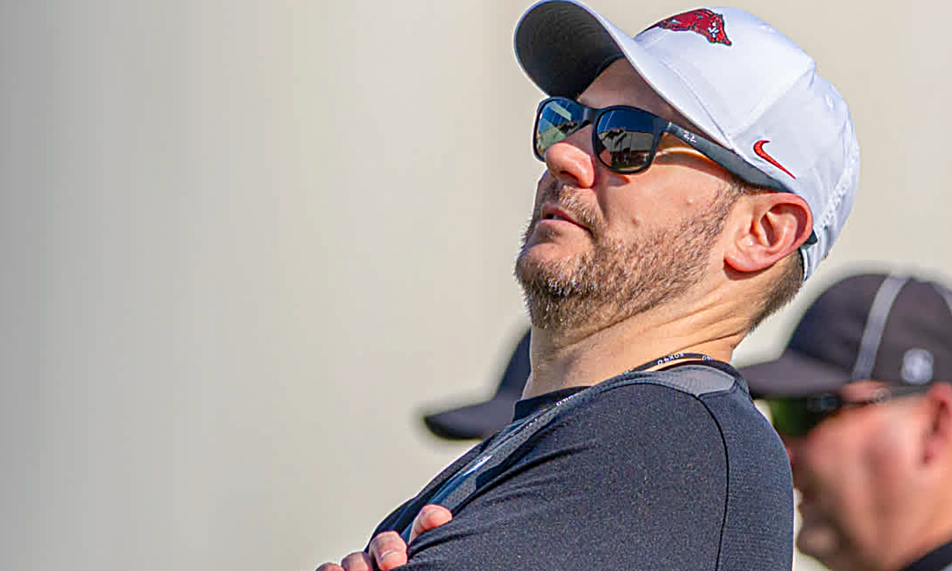 Arkansas coach Ryan Silverfield leans back in reaction to a play in spring practice.