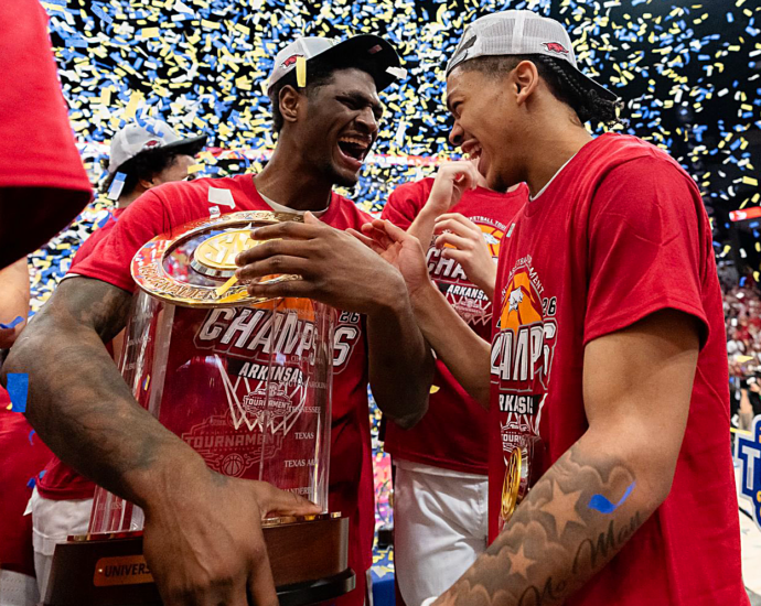 Arkansas celebrates winning the SEC Tournament.