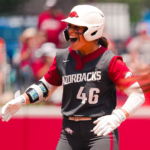 The Arkansas Razorbacks' Kailey Wyckoff celebrates a hit during the 2026 season.
