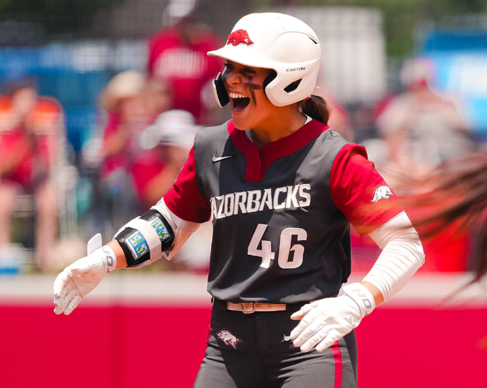 The Arkansas Razorbacks' Kailey Wyckoff celebrates a hit during the 2026 season.